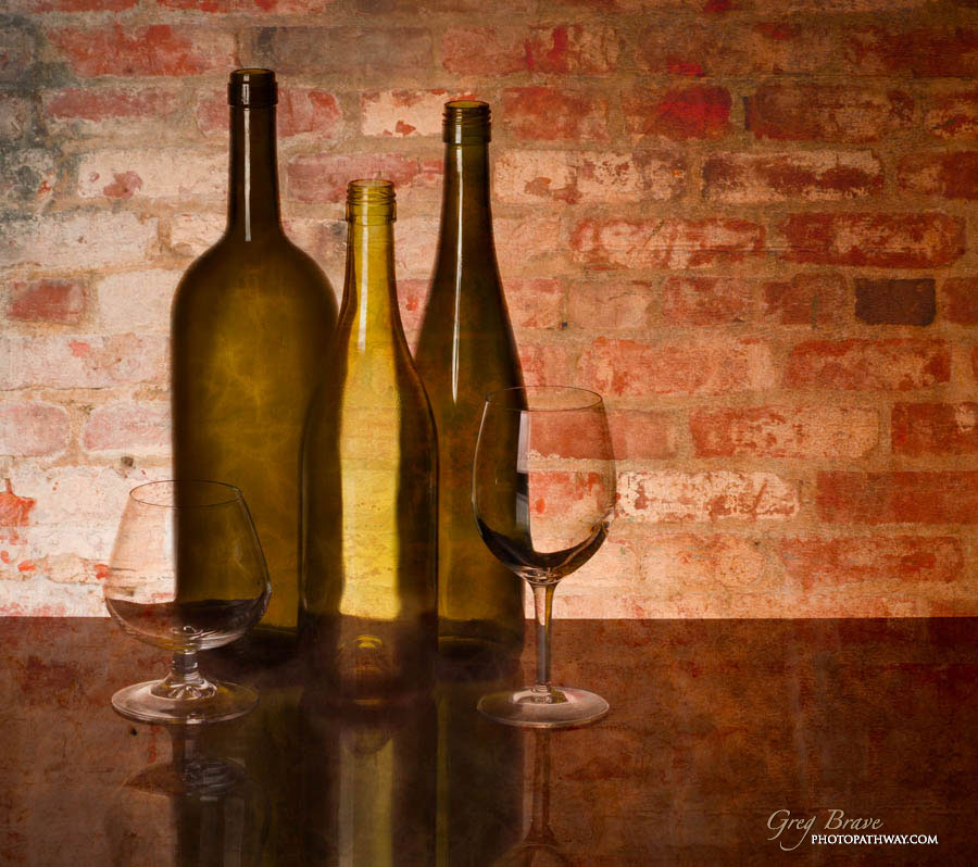 Still life with bottles and glasses in color by greg brave