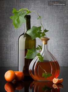 Still Life with bottles, mandarins, and leafs