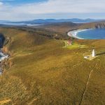 Aerial view of South Bruny National Park and Lighthouse at sunset. Bruny Island, Tasmania, Australia