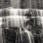 Famous Russell Falls closeup in black and white. Mount Field National Park, Tasmania, Australia