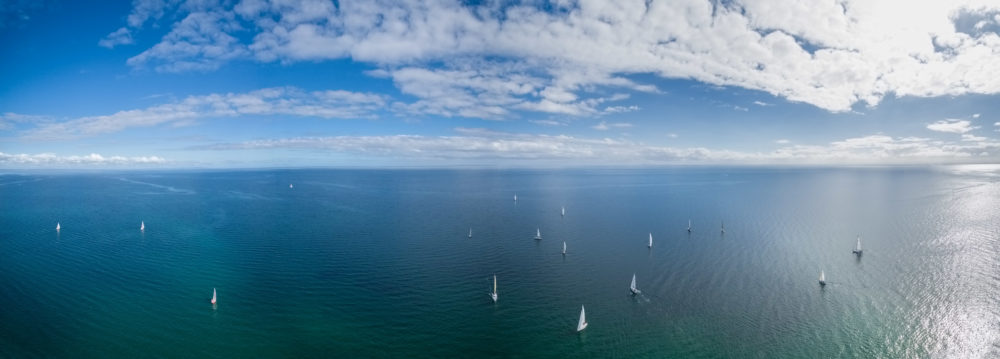 Aerial panorama of many sailboats sailing in Port Phillip Bay on Mornington Peninsula. Melbourne, Victoria, Australia